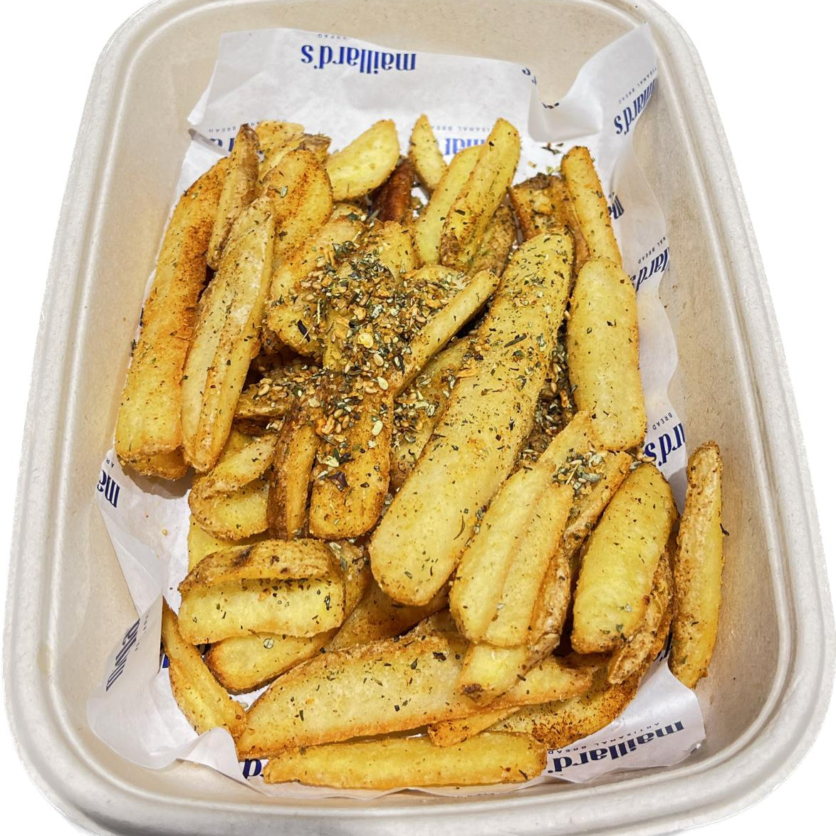 Bowl of seasoned French fries on a white background
